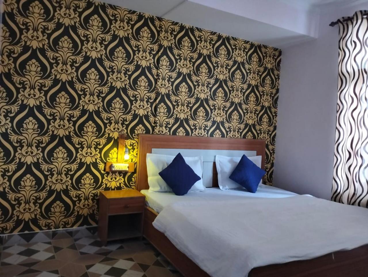Aman Inn Дхарамсала Екстериор снимка