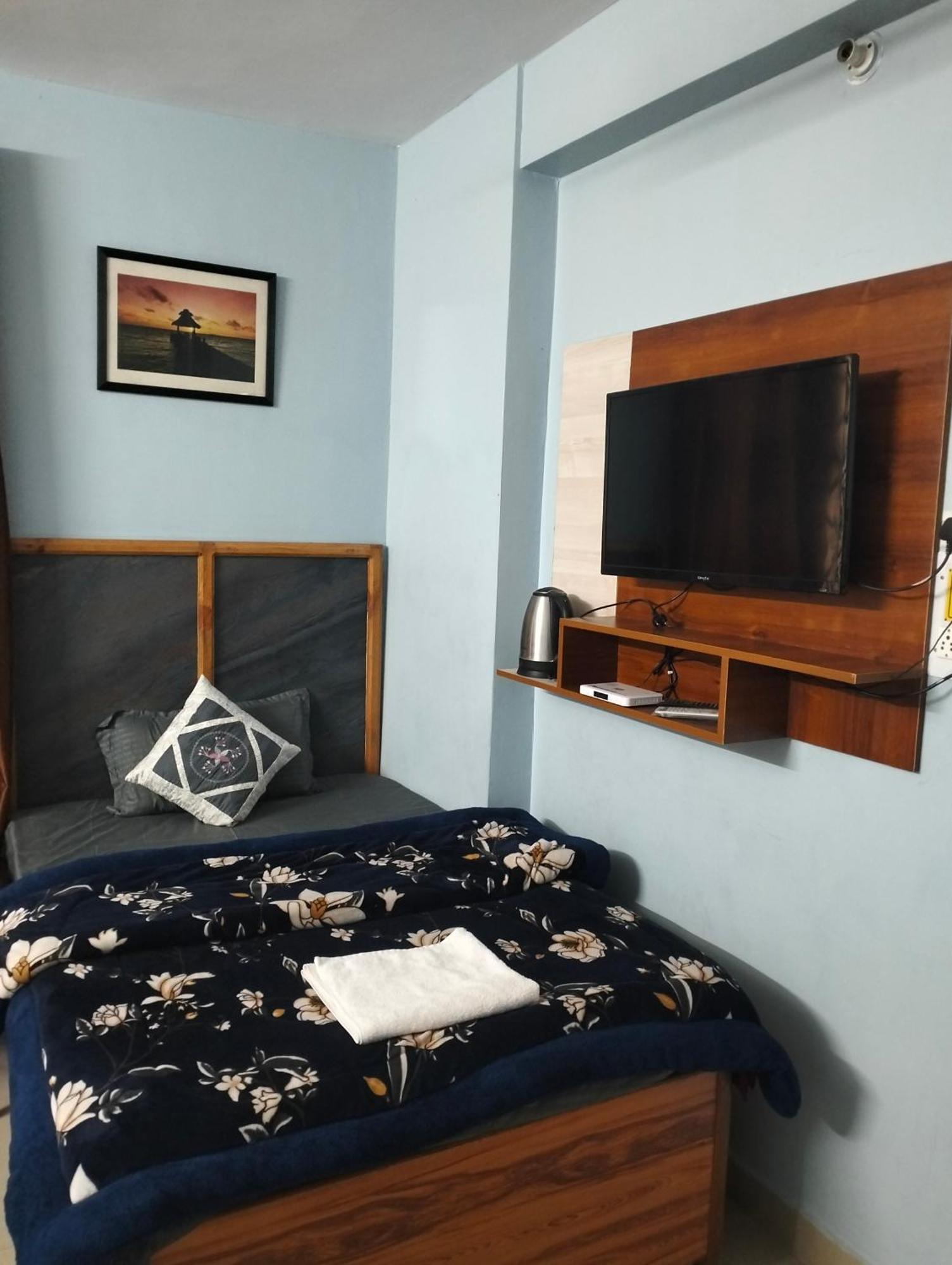 Aman Inn Дхарамсала Стая снимка